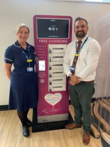 Sister Karen Kefallinos with Charity Manager Ben Petts with the new phone charge bank at Lincoln County Hospital