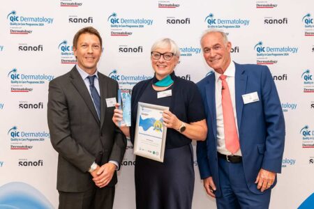 Nicola (centre) receiving her award from Dr Hilary Jones (right) and Steve Symonds (left) from Sanofi who sponsored the awards.