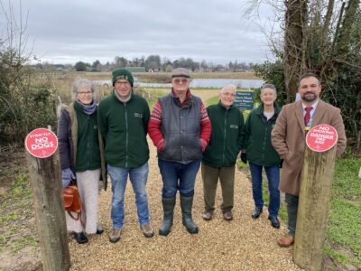 Boston Woods Trust Trustee Claire Elwood, Chairman Steve Elwood, Volunteer Simon Horniblow, President Adrian Isaac and Secretary Frances Brooks with United Lincolnshire Hospitals Charity Manager Ben Petts. They are stood at the new entrance from Pilgrim hospital.